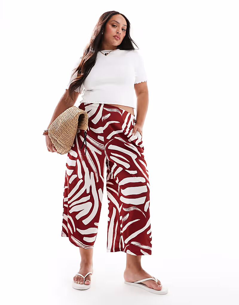 

Укороченные брюки New Look Curve с абстрактным принтом коричневого цвета New Look Plus