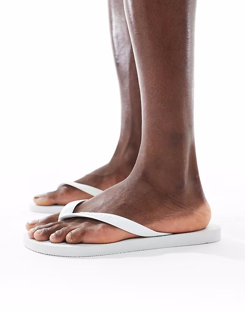 Классические шлепанцы Havaianas унисекс белого цвета — фото 3