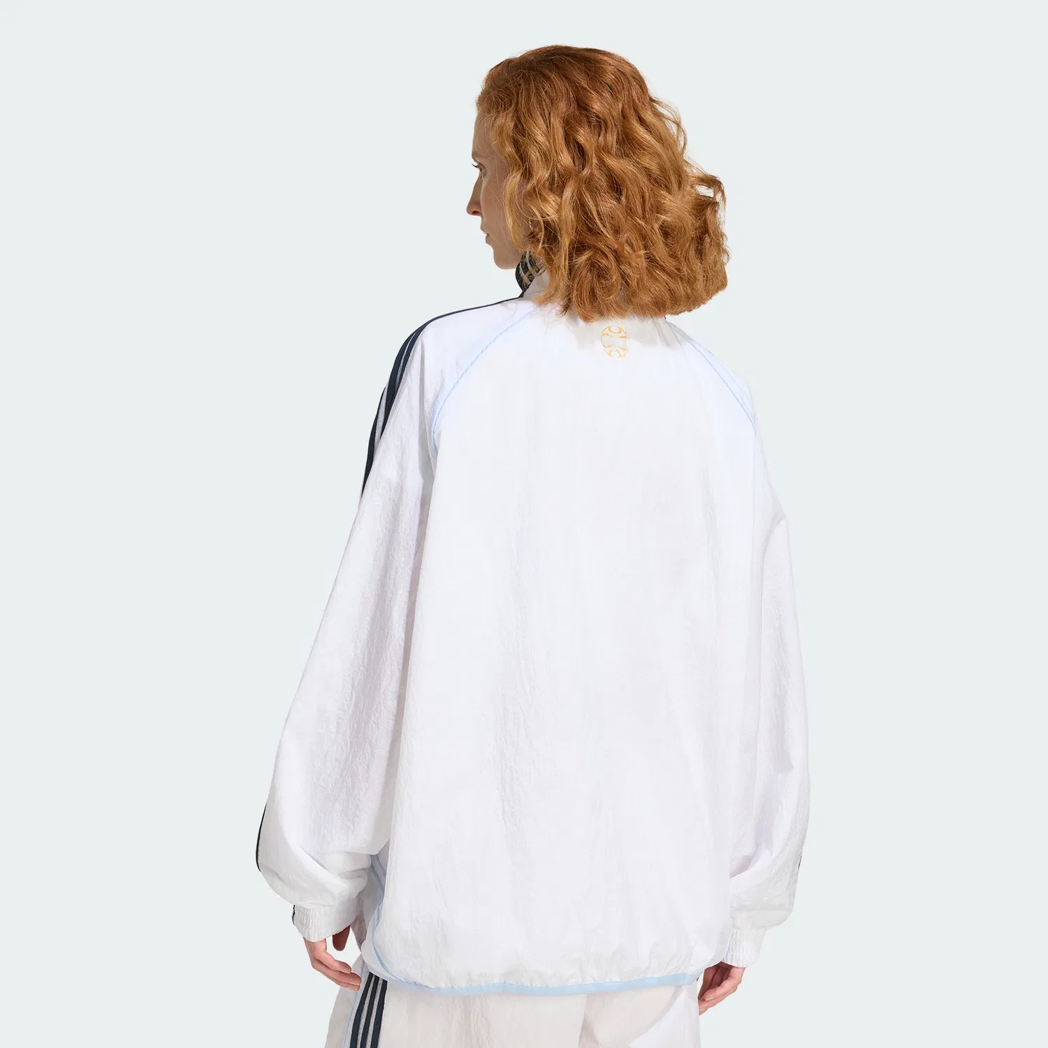 Женская спортивная куртка Teamgeist 2.0 Track Top белого цвета от Adidas — фото 2