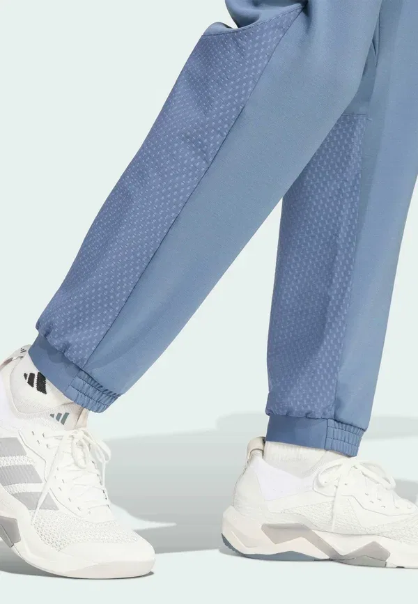 Теплые брюки из технологичной одежды - спортивные штаны Adidas Performance, чернильный — фото 3