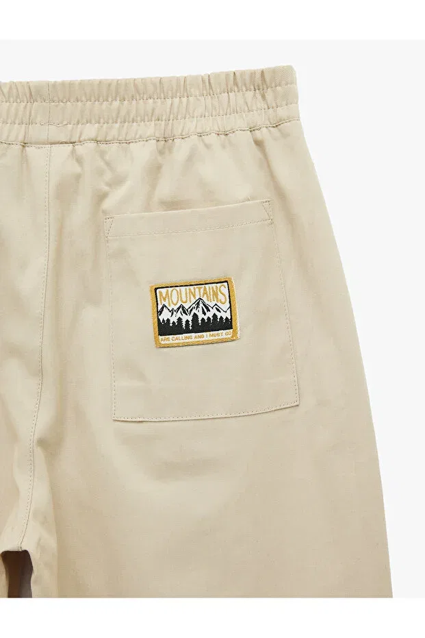 Детские брюки для девочек свободного кроя Elastic waist oversize balloon cut trousers Koton, Beige — фото 4