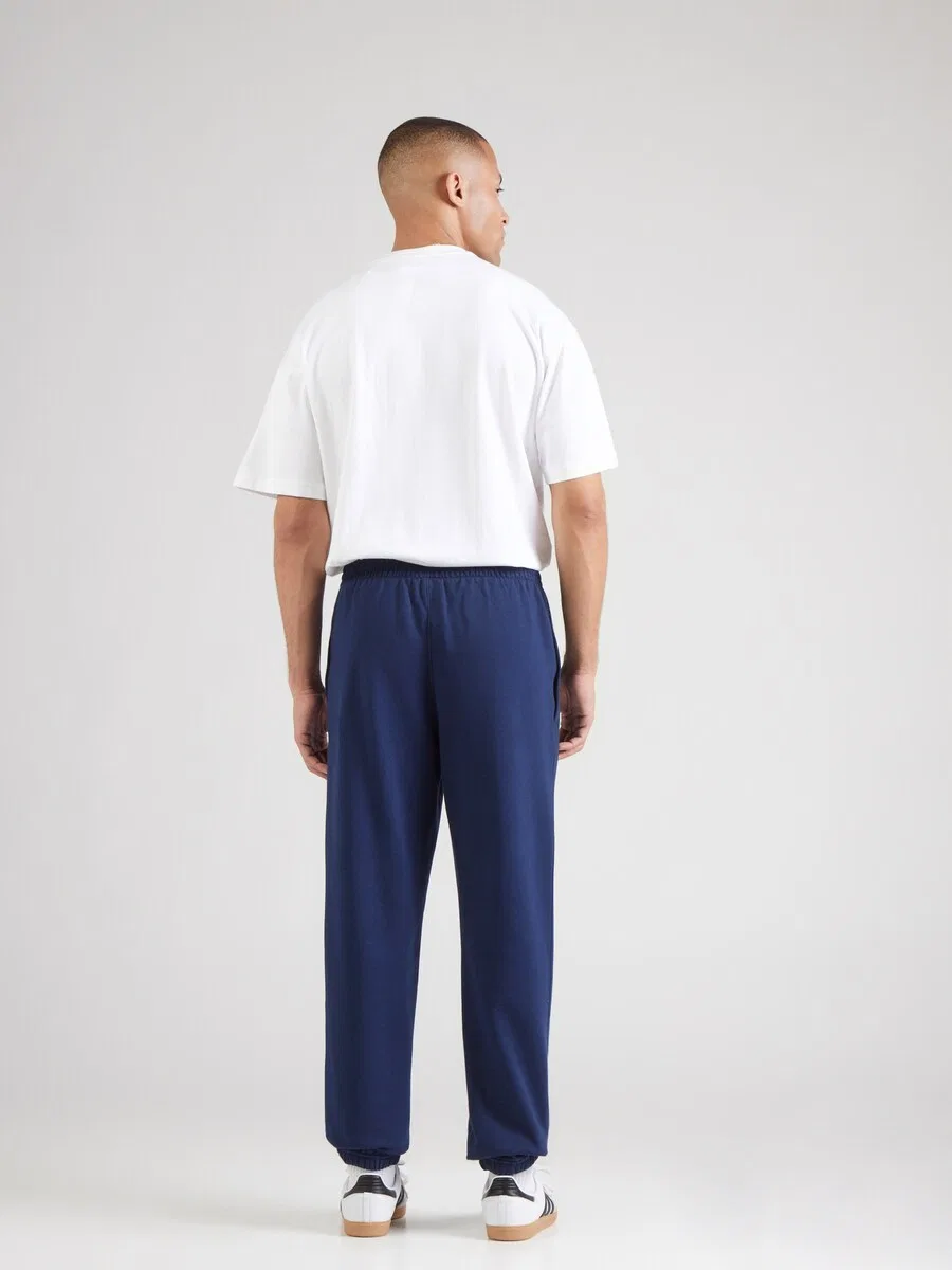 Зауженные брюки ADIDAS ORIGINALS 'ESSENTIALS' темно-синего цвета — фото 4