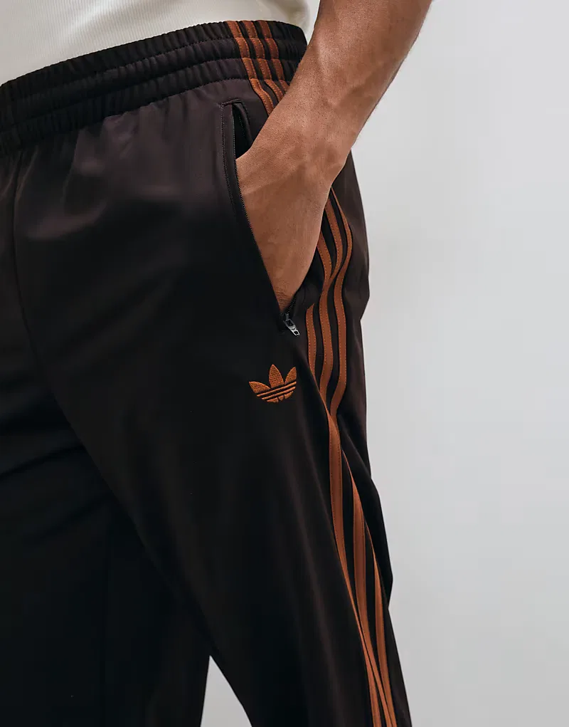 Спортивные брюки Adidas Originals Firebird коричневого и оранжевого — фото 4