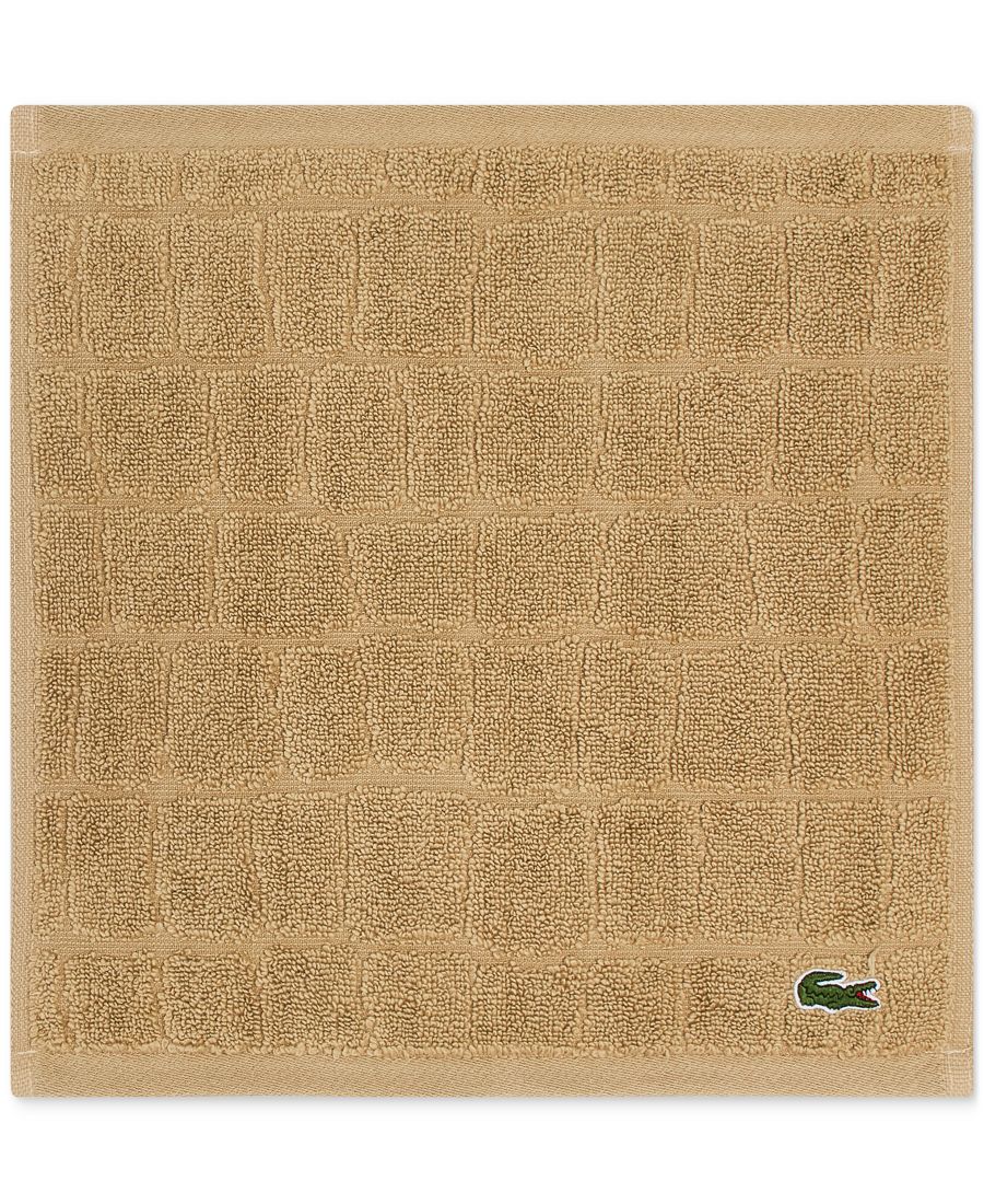 

Хлопковая мочалка heritage croc scale, 13 x 13 дюймов. Lacoste Home, Sand