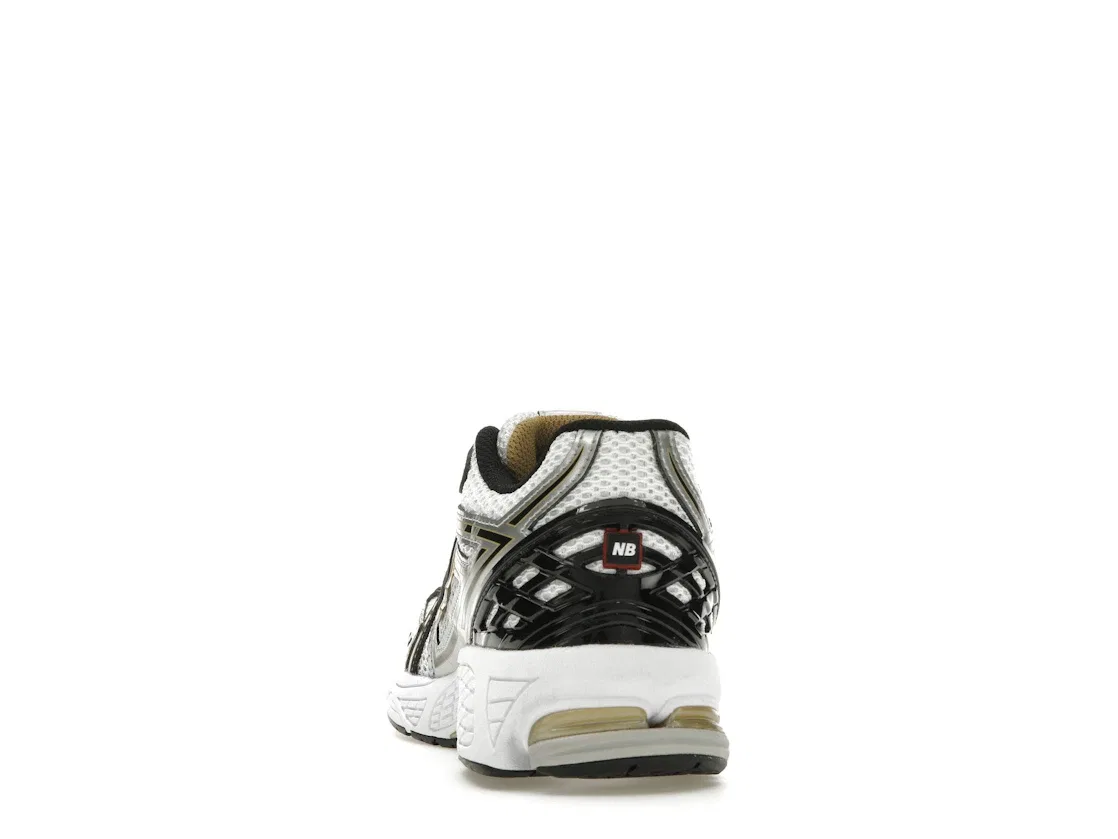 Детские кроссовки с контрастной отделкой New Balance 1906R, Silver Metallic/Gold Metallic — фото 4
