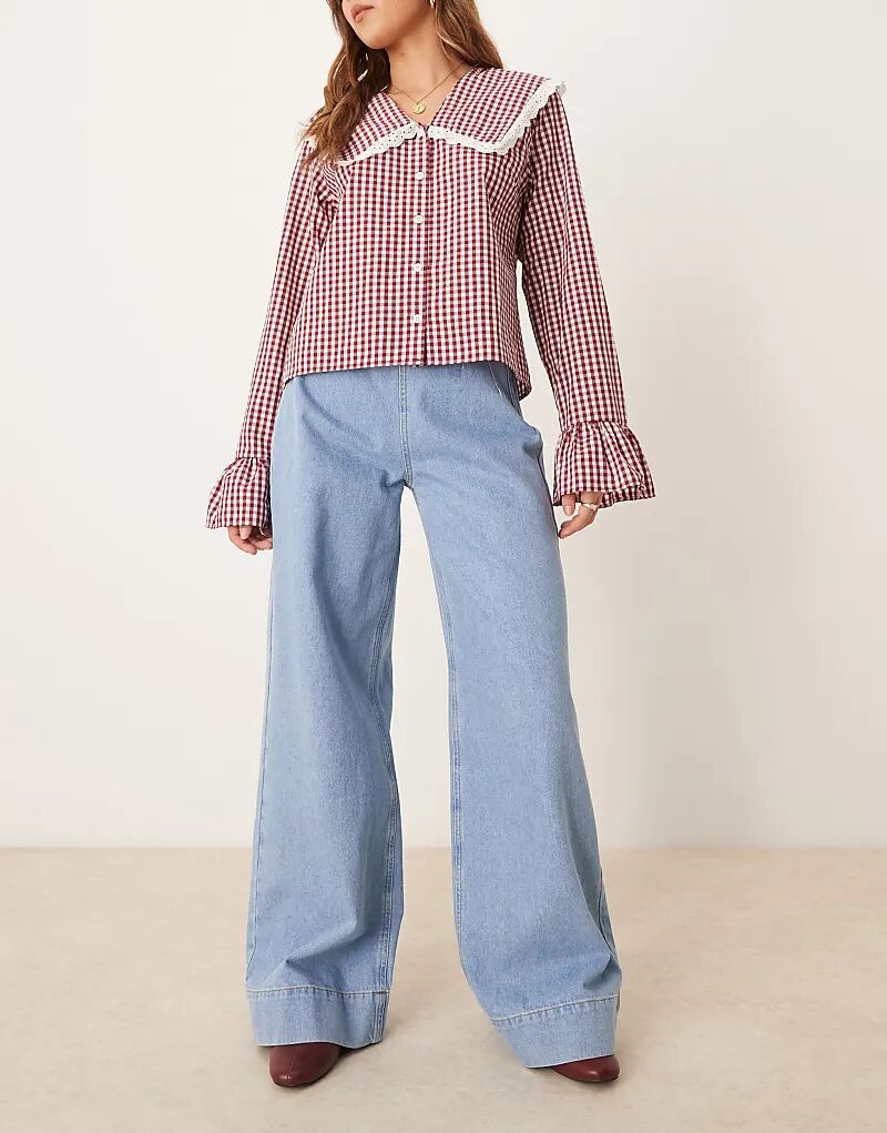 

Джинсы с защипами в средне-синем цвете ASOS DESIGN