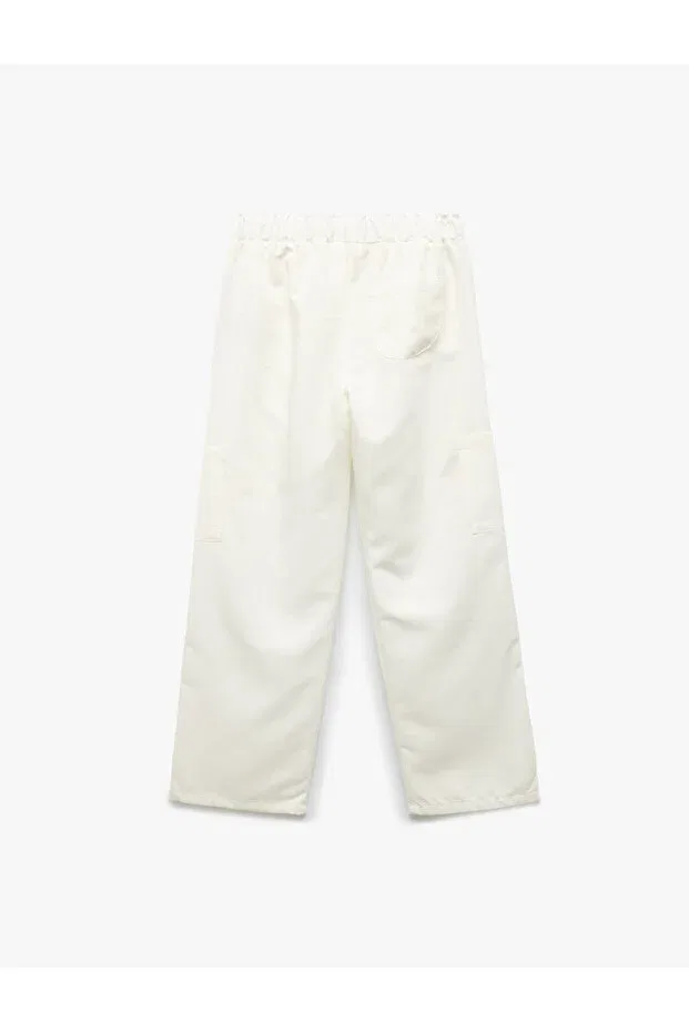 Детские брюки карго для девочек хлопковые Viscose blended pocketed loose fit cargo pants Koton, Ecru — фото 2