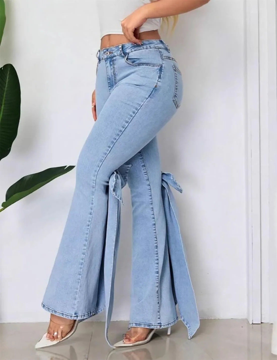 Джинсы женские high waisted с бантом и расклешенным силуэтом — фото 4