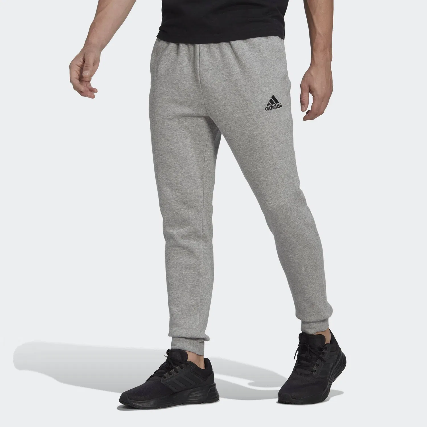 Мужские спортивные штаны из флиса Essentials Fleece Regular Tapered Hose Adidas, Grau Schwarz