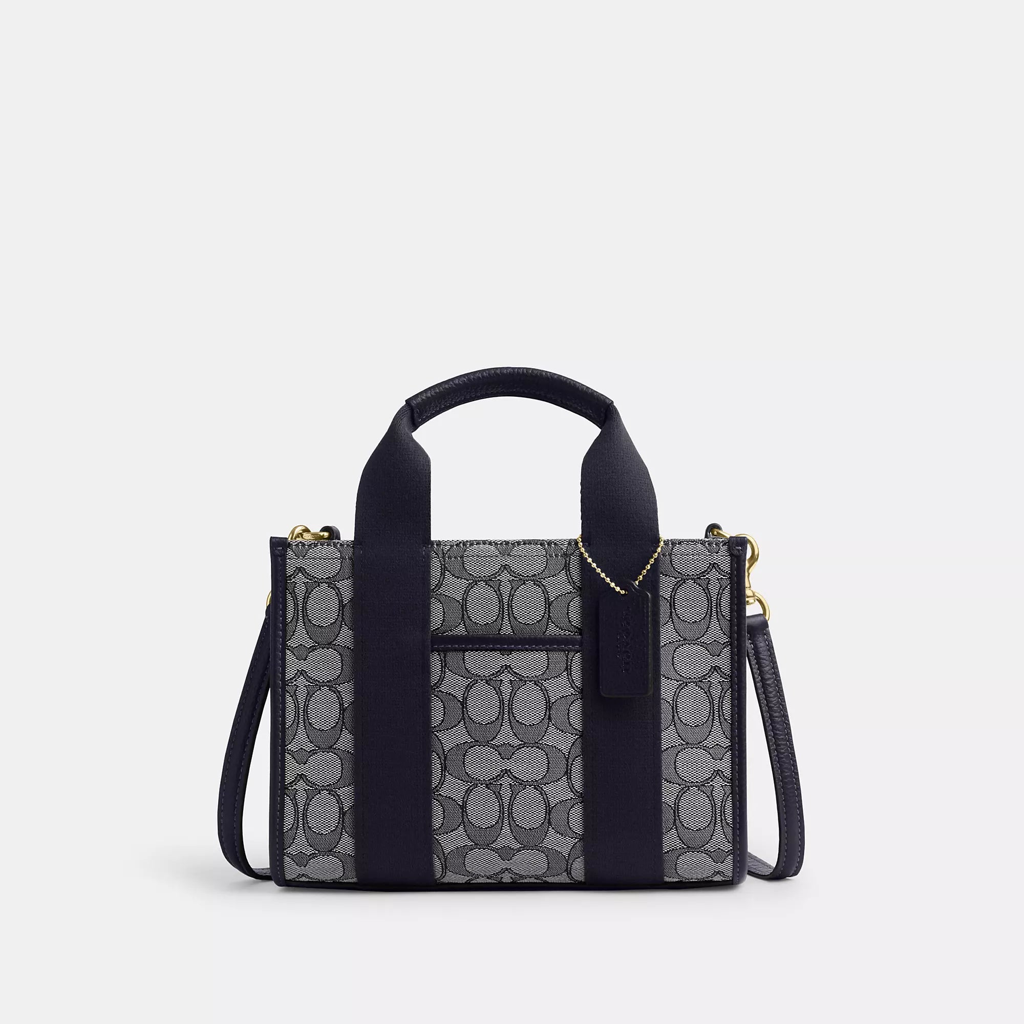 

Coach Outlet Смит Сумка-тоут 24 дюйма в фирменном жаккарде, золотой/темно-синий