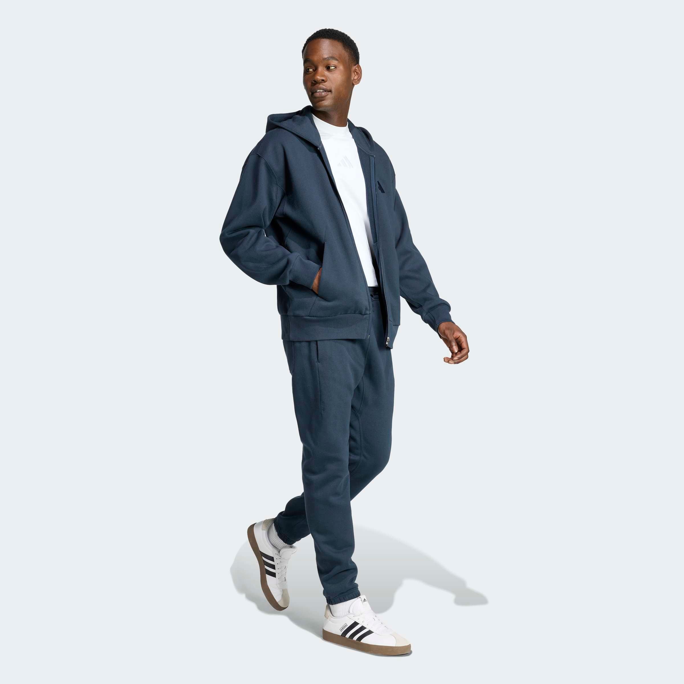 

Adidas Sportswear Зауженные спортивные штаны в синем, темно-синем