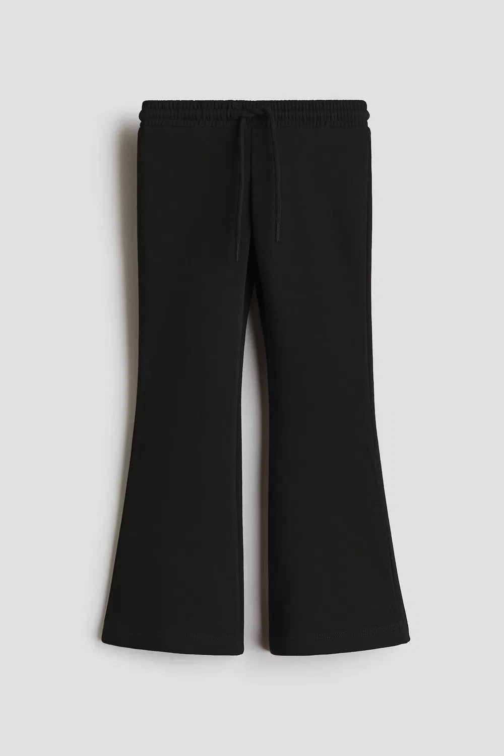 Расклешенные спортивные брюки из смесовой хлопковой ткани H&M, Schwarz