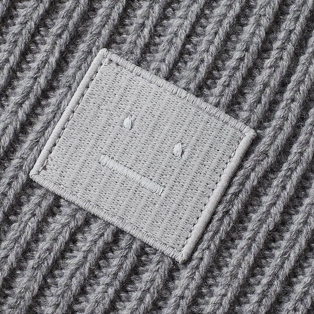 

анютины глазки н лицо шапочка Acne Studios