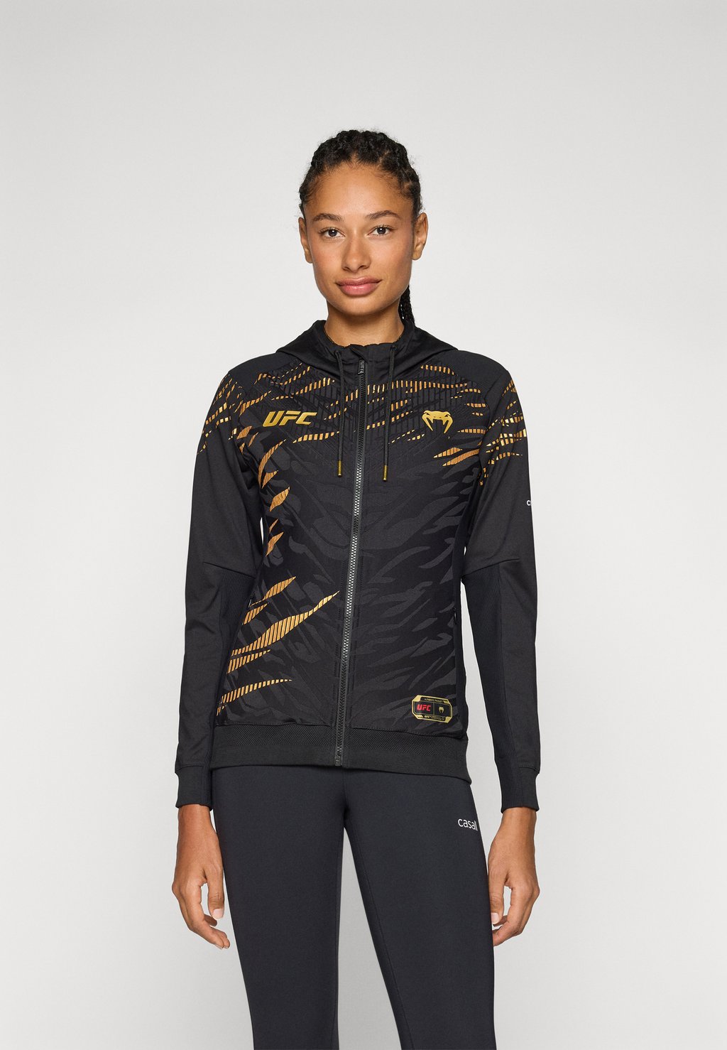 

Тренировочная куртка UFC FUSION AUTHENTIC FIGHT NIGHT WOMENS WALKOUT HOODIE CHAMPION Venum, черный