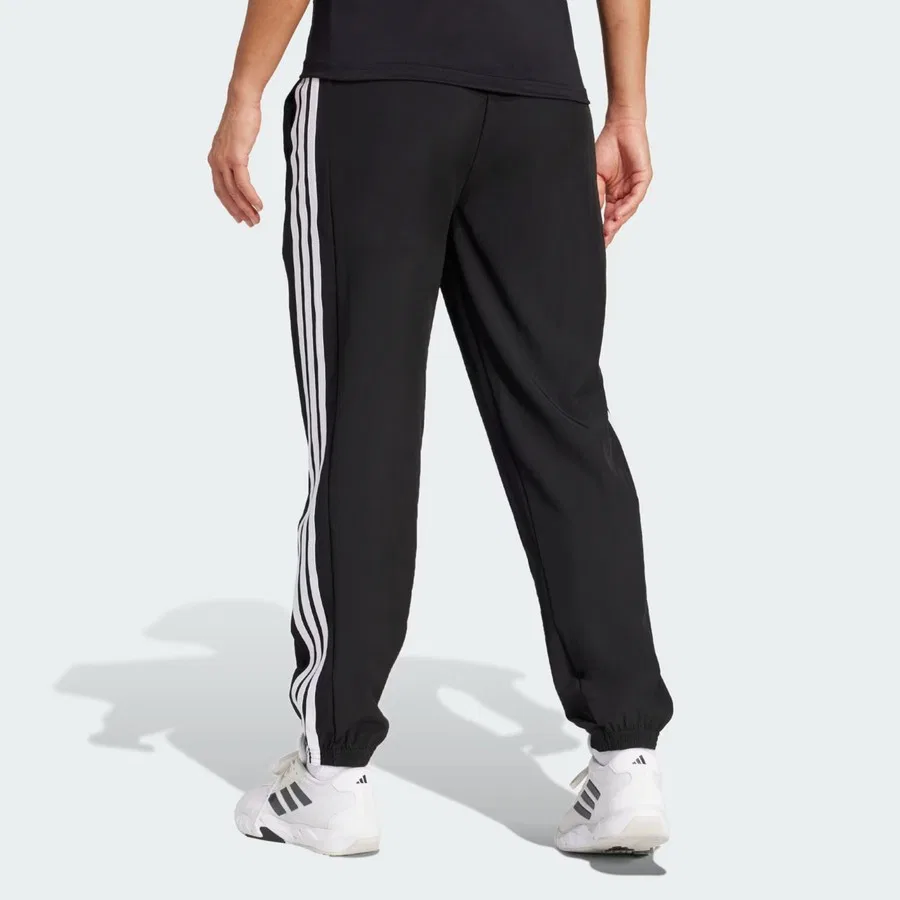 Спортивные брюки с зауженным низом Train Essentials 3-Stripes adidas, Черный — фото 2