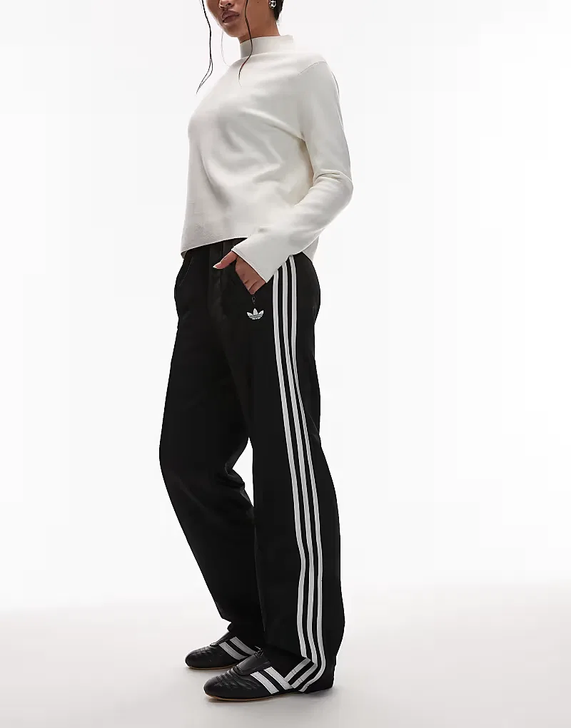 Спортивные брюки Adidas Originals Firebird в черно-белом цвете