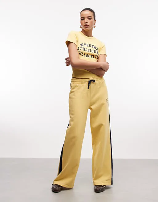 

Желтые джоггеры широкого кроя Weekend Collective с контрастной полоской