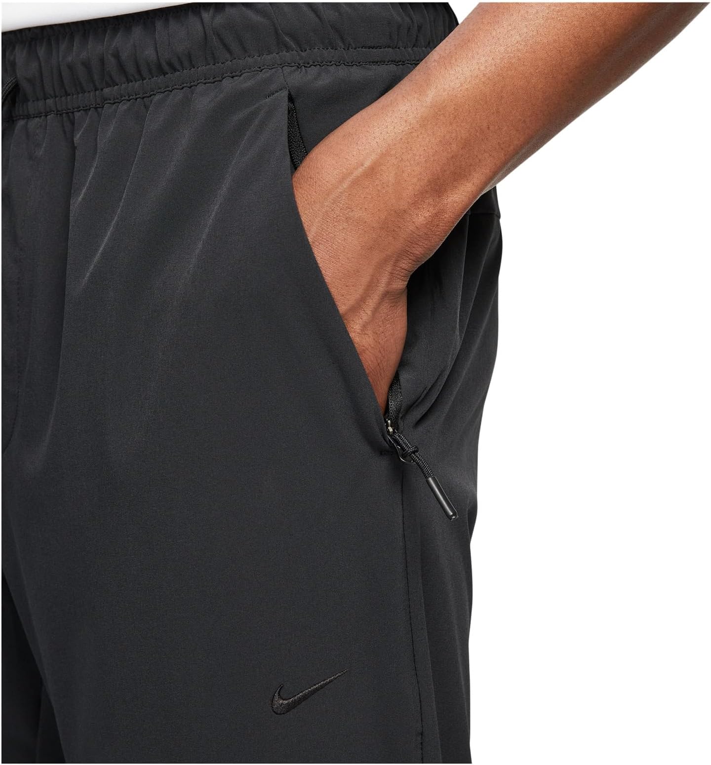 Мужские универсальные зауженные брюки Unlimited Dri-FIT Nike, Black/Black/Black — фото 3