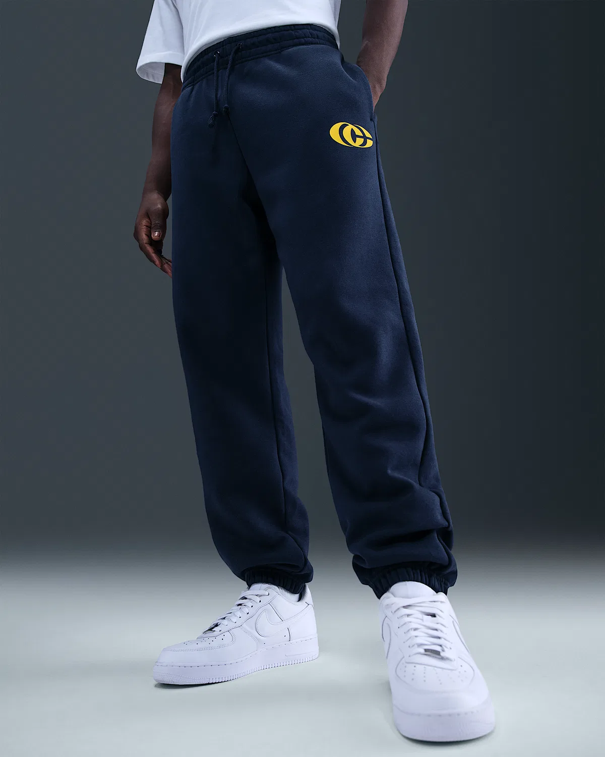 Nike Basketball Phoenix Fleece Pants Caitlin Clark, Midnight Navy/Amarillo/Amarillo — фото 2