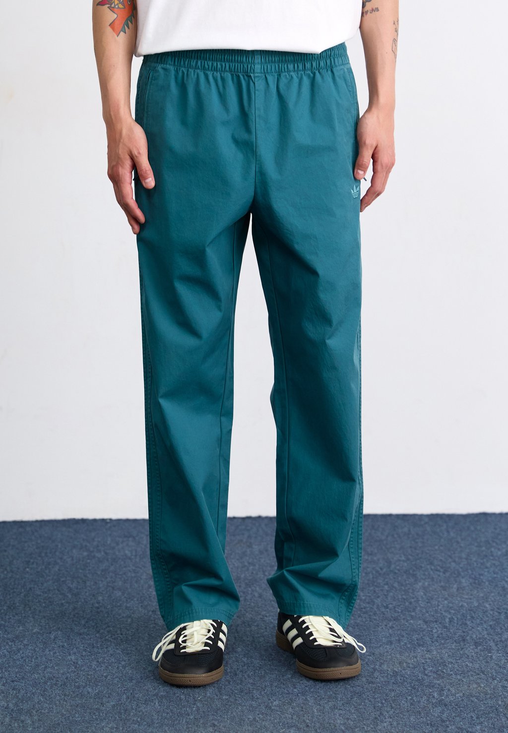 

Брюки FIREBIRD PANTS Adidas Originals, темно-зеленый