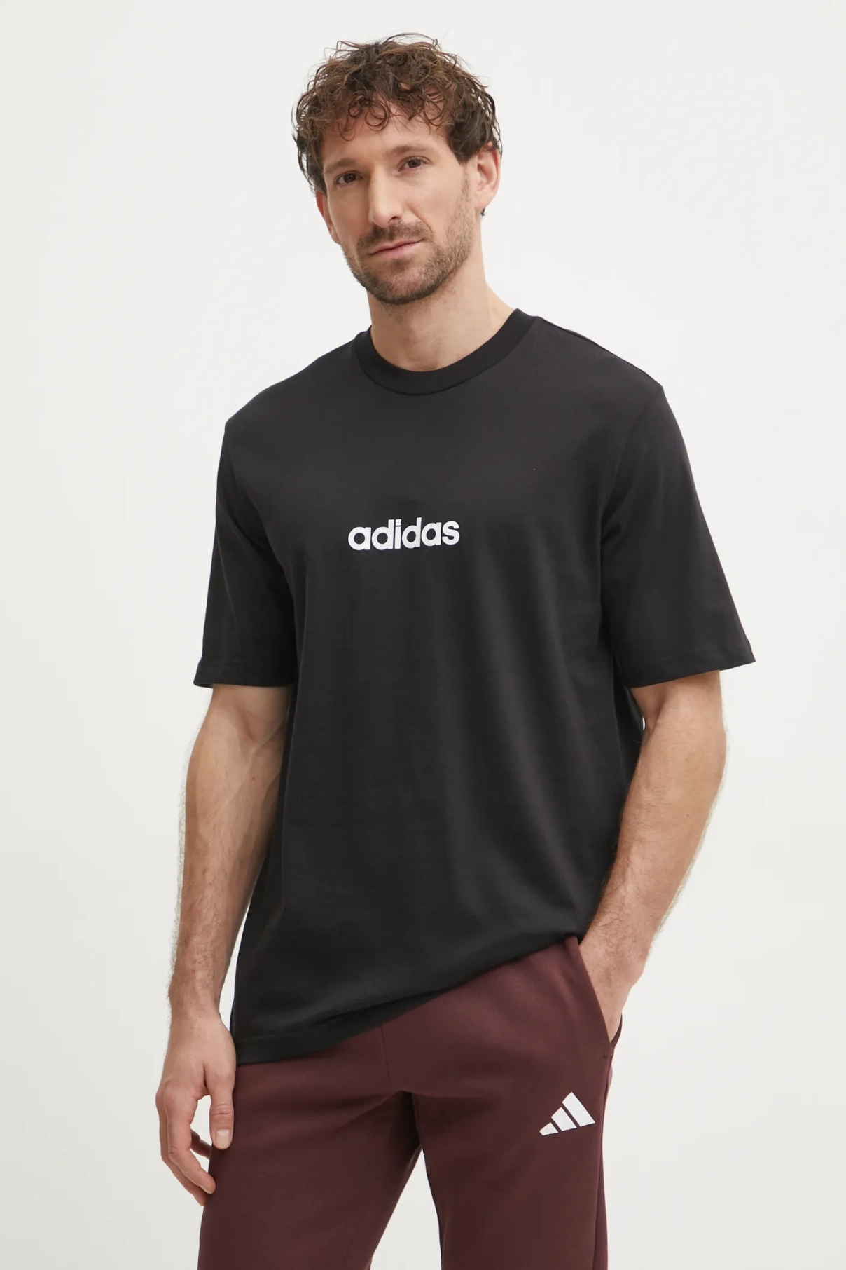 

Футболка Essentials Linear из хлопка adidas, черный