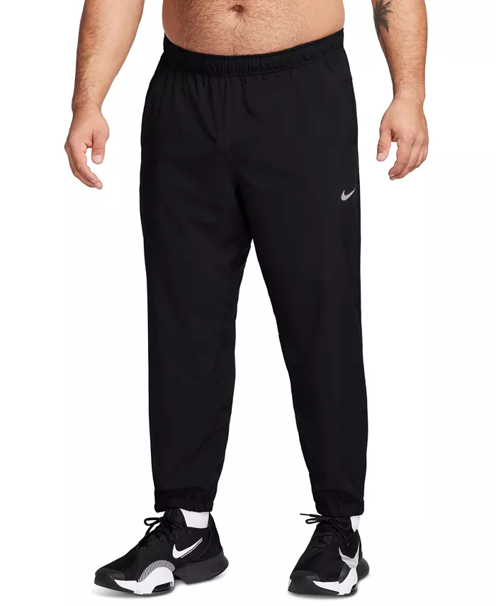 

Мужские тренировочные брюки Form Dri-FIT стандартной посадки с сужением к низу Nike, черный