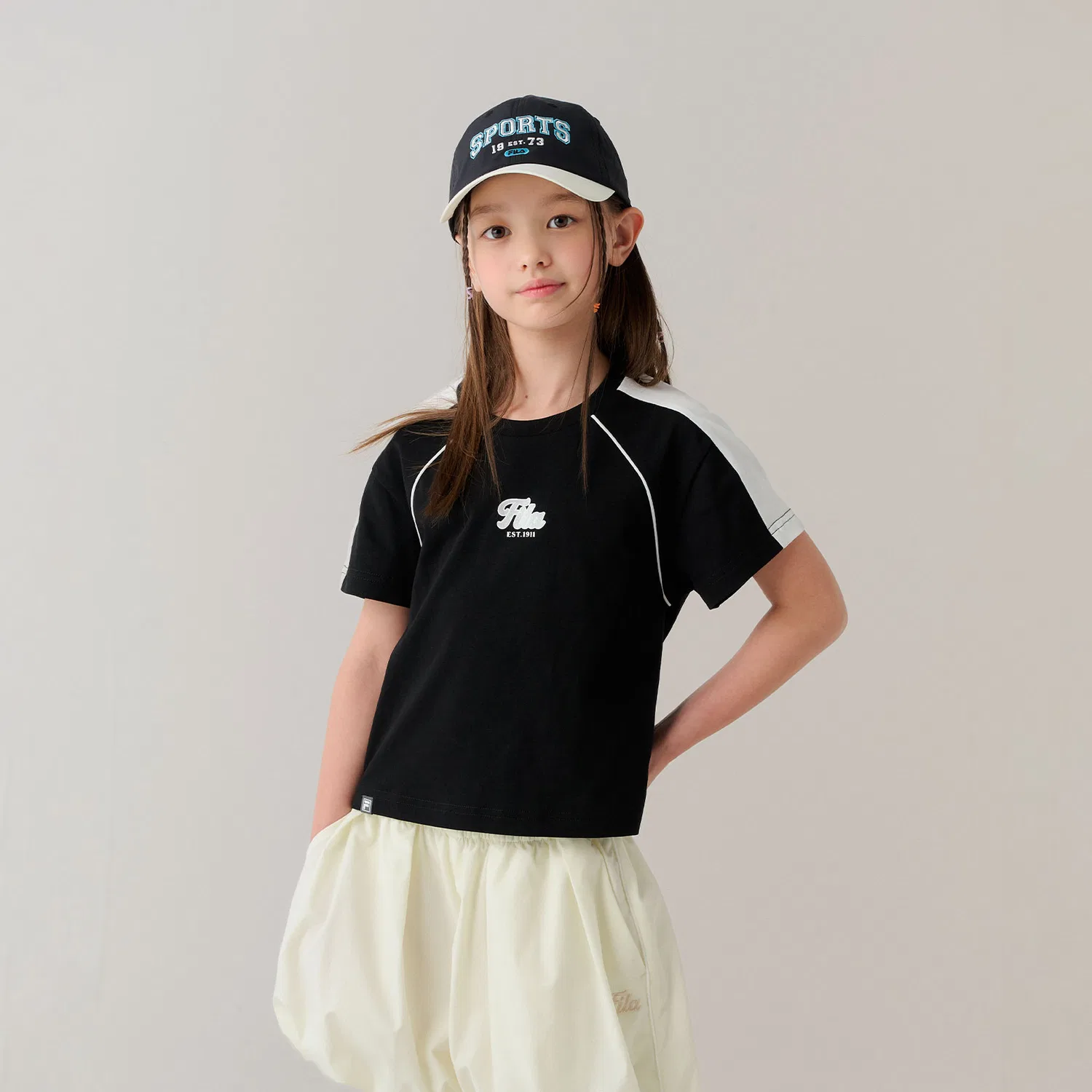 Детская футболка с контрастными рукавами чёрная от Fila Kids