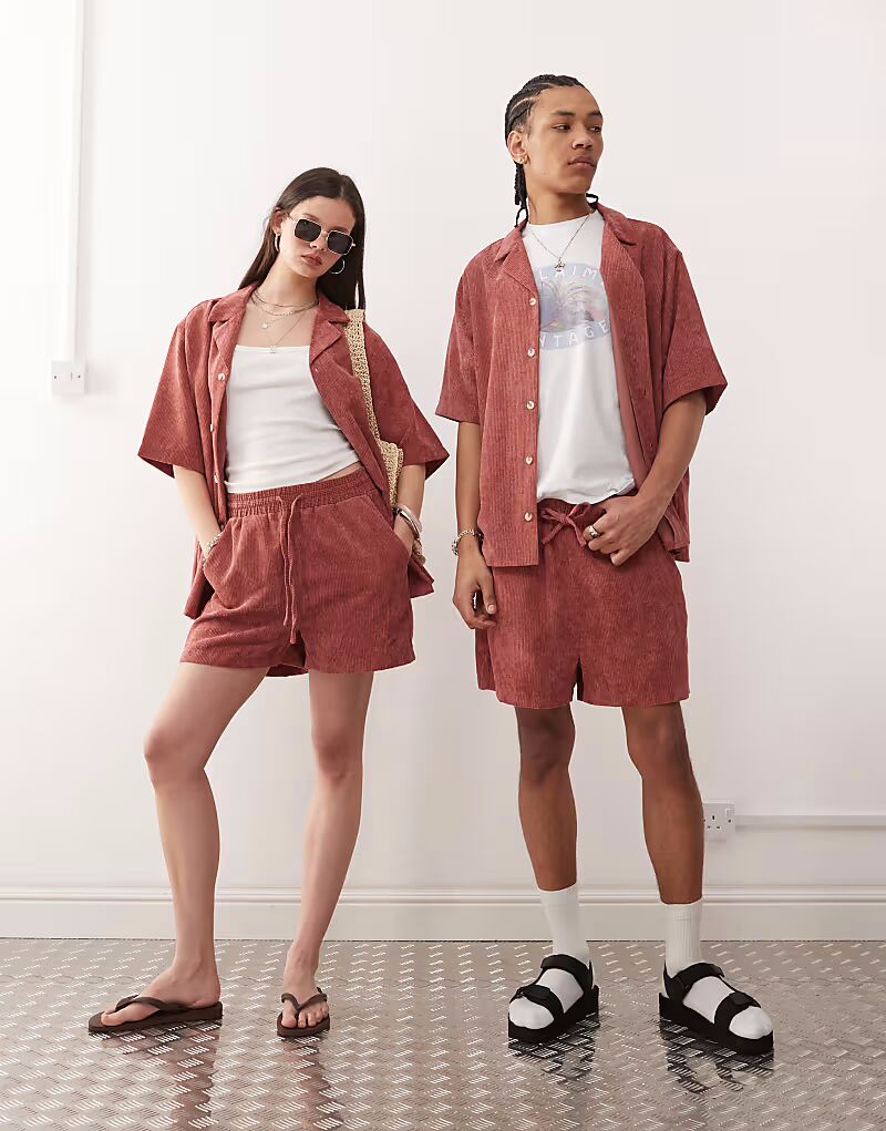 

Короткие шорты унисекс из регенерированного винтажного материала розового цвета Reclaimed Vintage