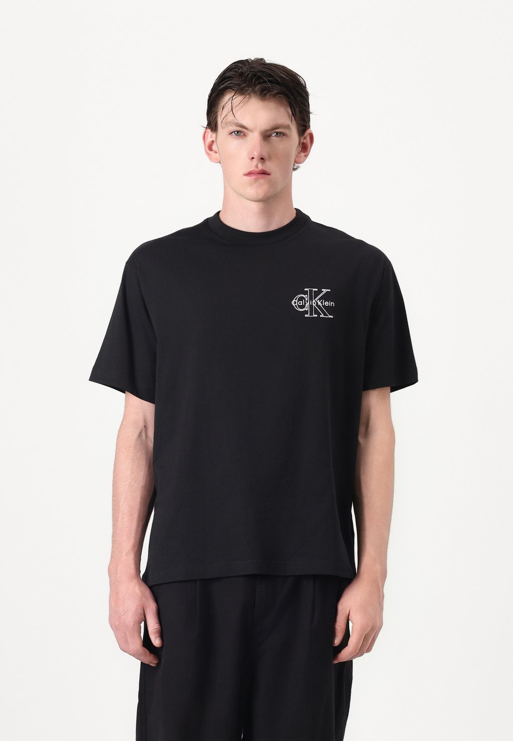 

Базовая футболка SEASONAL MONOLOGO TEE Calvin Klein Jeans, черный
