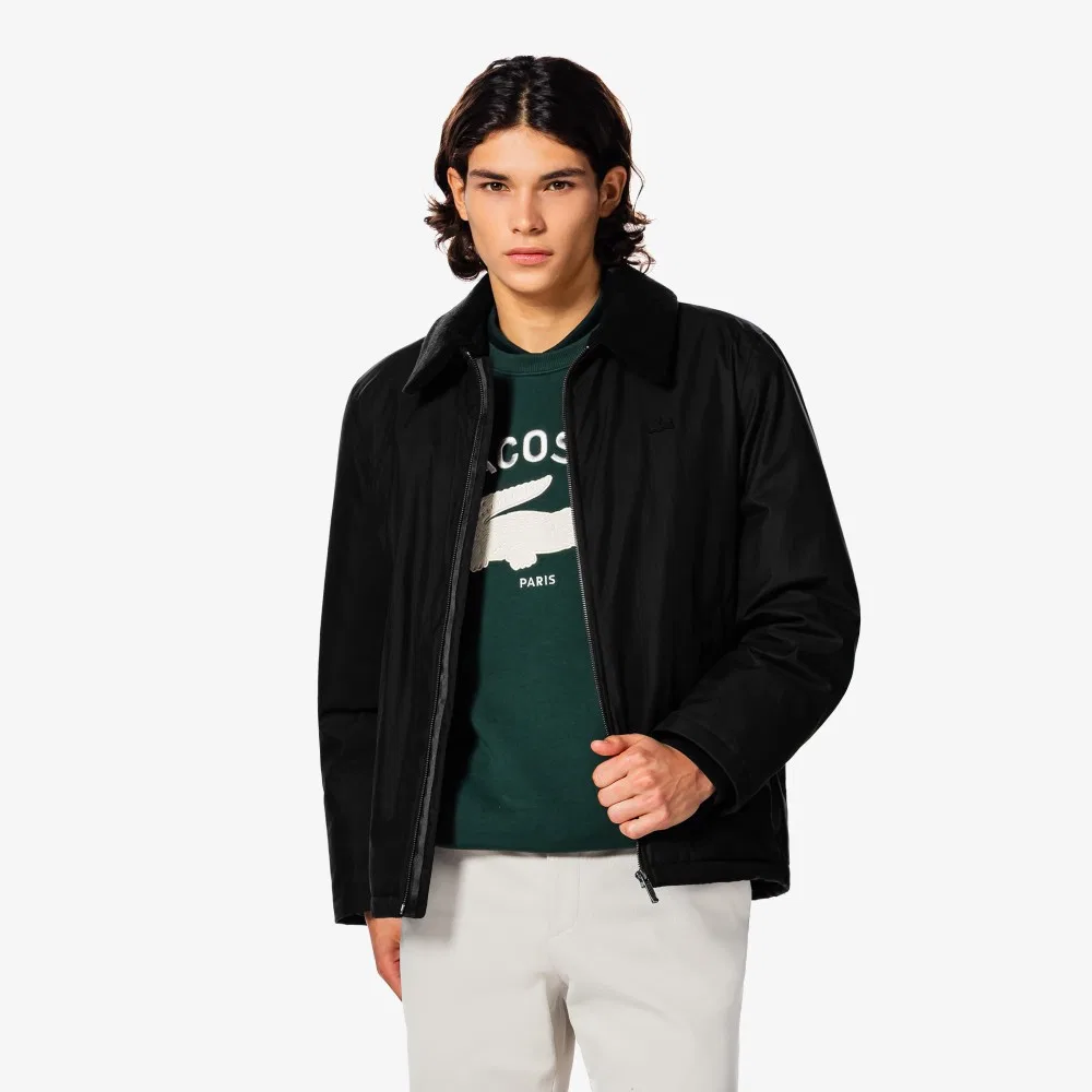 Мужской пуховик с воротником шерпа чёрного цвета от Lacoste