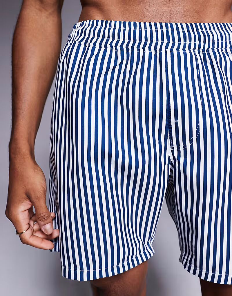 

Плавки-шорты ASOS DESIGN средней длины в темно-синюю полоску