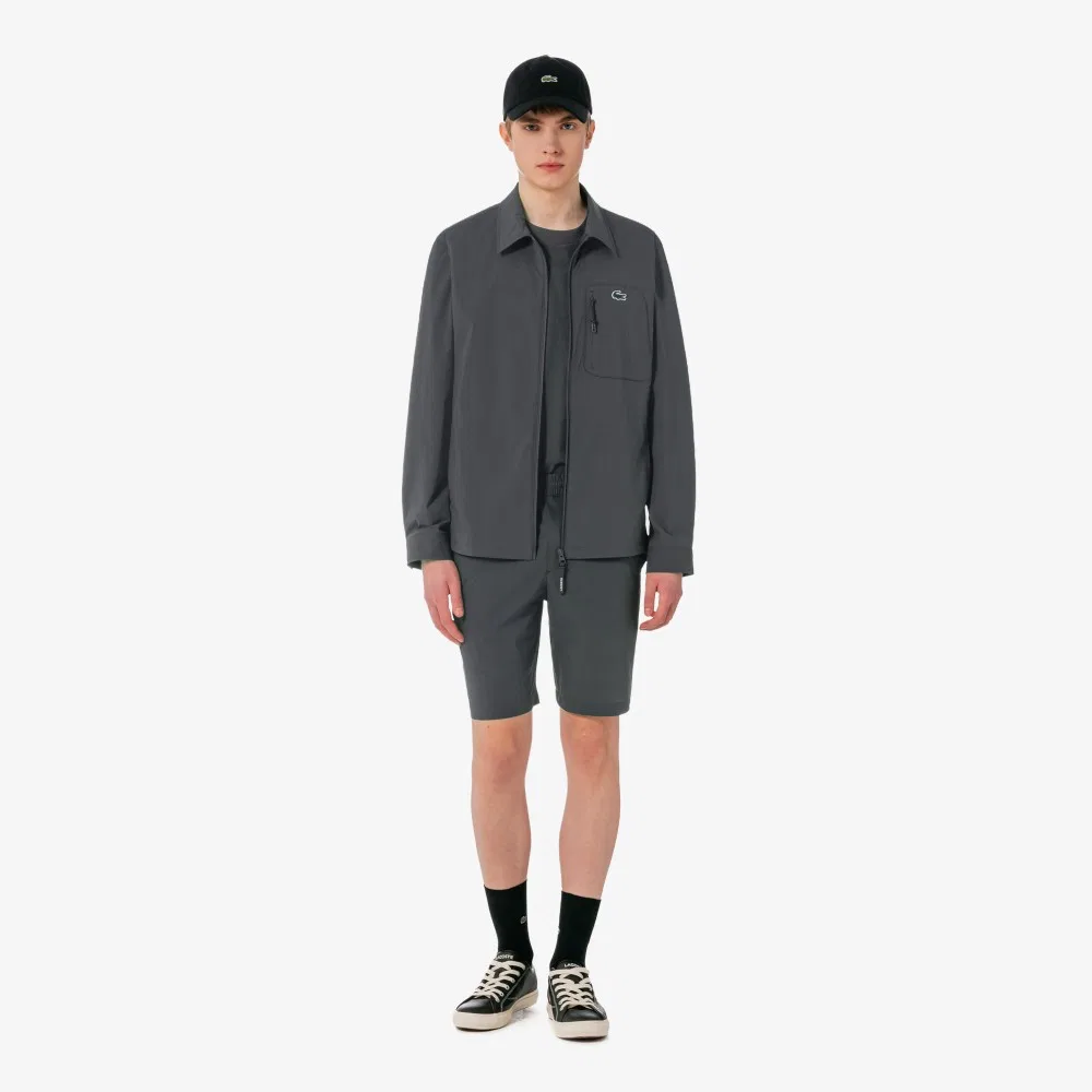 Мужские теннисные шорты из тканого материала тёмно-серые от Lacoste