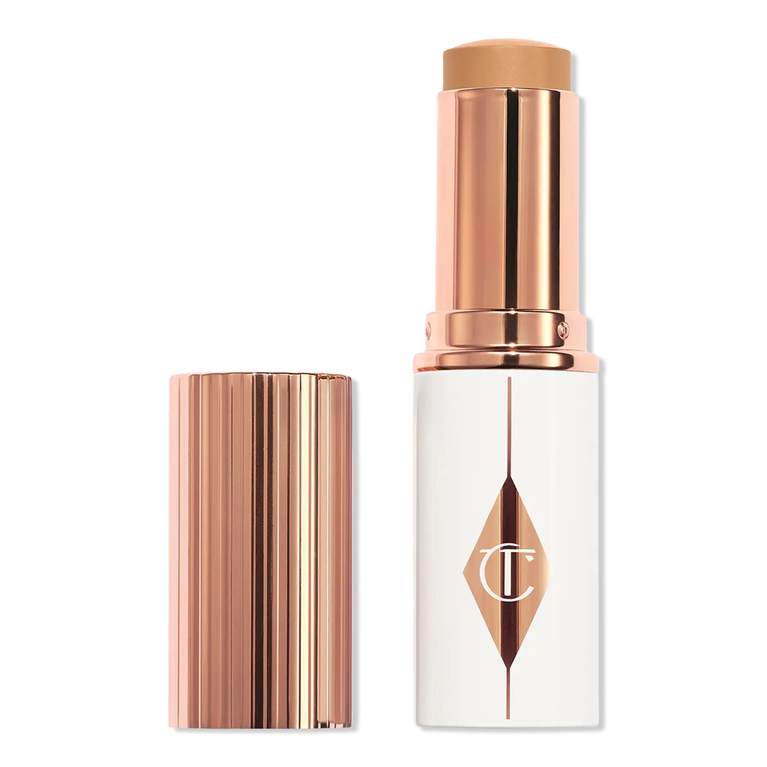 

Увлажняющий тональный крем-стик Unreal Skin Sheer Glow Tint Charlotte Tilbury, 9 Tan (medium-tan with neutral undertones)