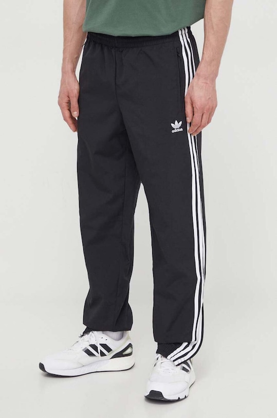 

Брюки Adicolor Woven Firebird Adidas Originals, черный