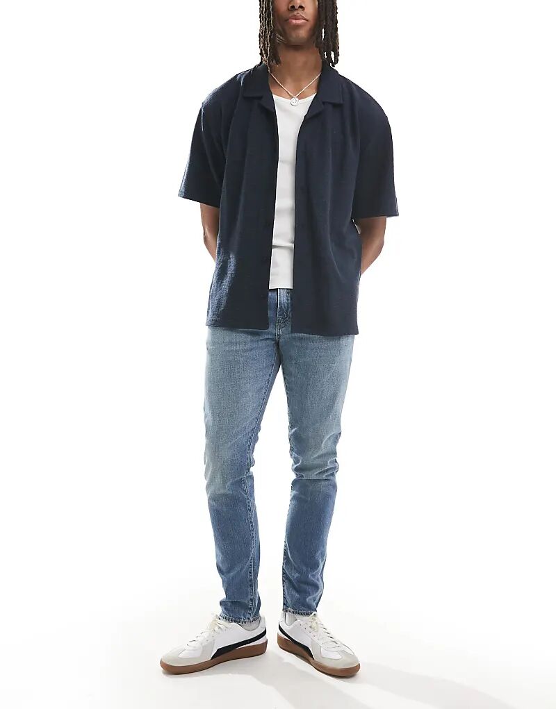 

Джинсы Levi's 502 зауженного кроя светлого цвета