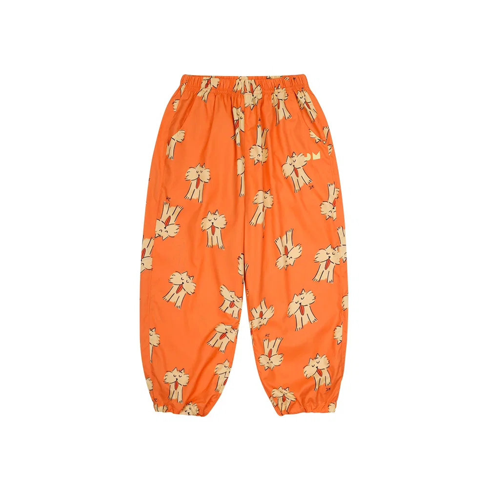 Детские двухсторонние спортивные брюки Puppy оранжевые от Jelly Mallow — фото 3