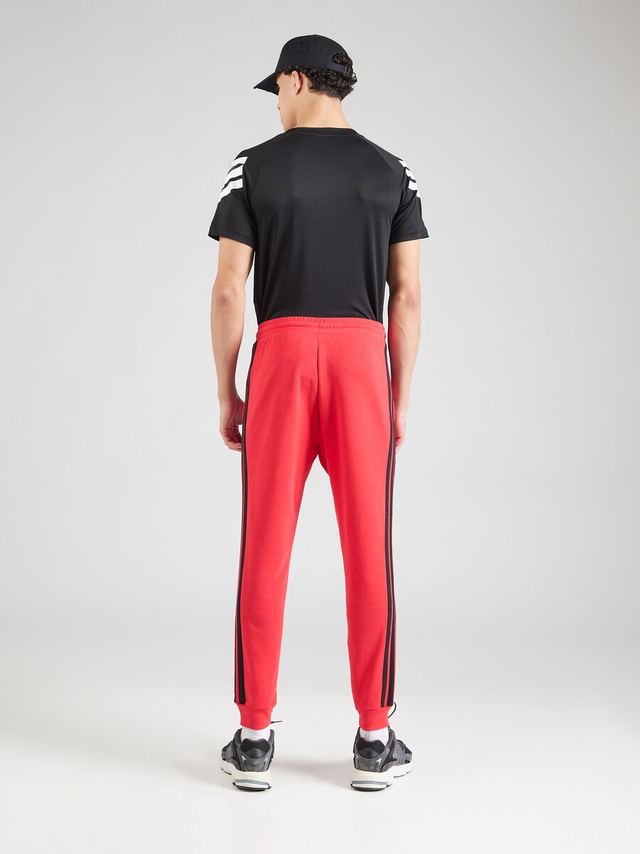 Зауженные тренировочные брюки ADIDAS SPORTSWEAR Essential, красный — фото 4