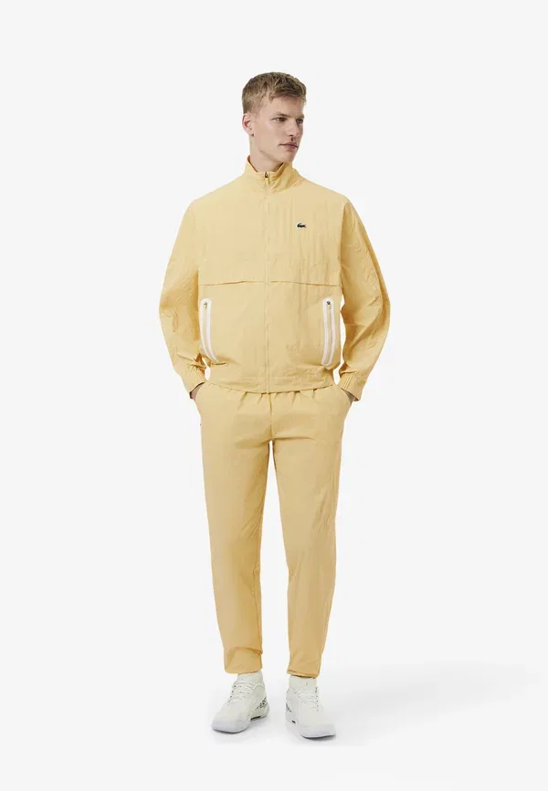 Спортивные брюки Lacoste, прямая форма, однотонные, синий