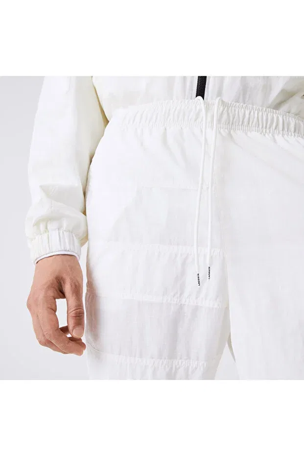 Мужские спортивные штаны на регулярной посадке Lacoste, White — фото 4