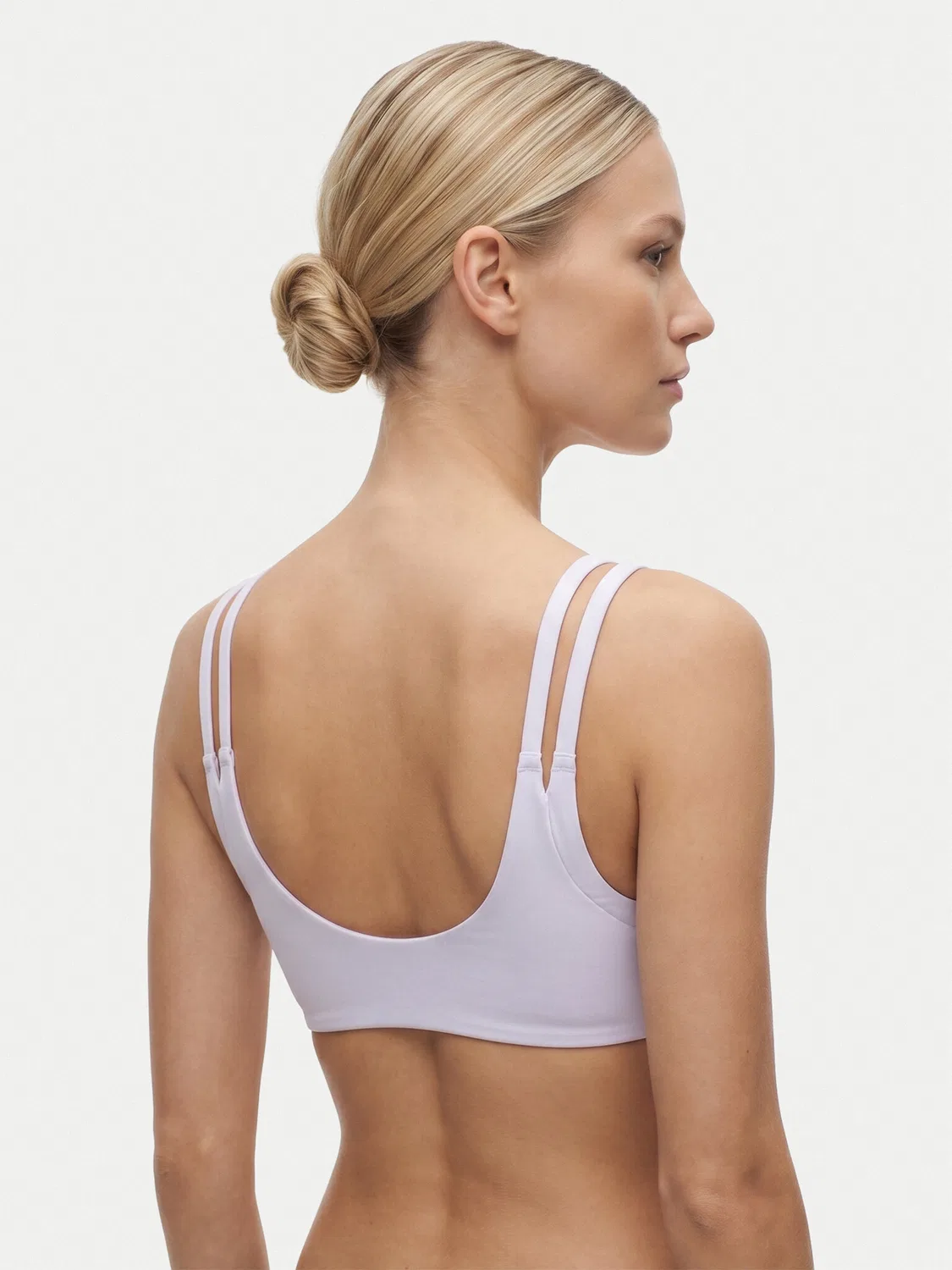 Женский спортивный бюстгальтер Optime Workout Reversible Twist Light Support Bra Adidas, светло-сиреневый — фото 2