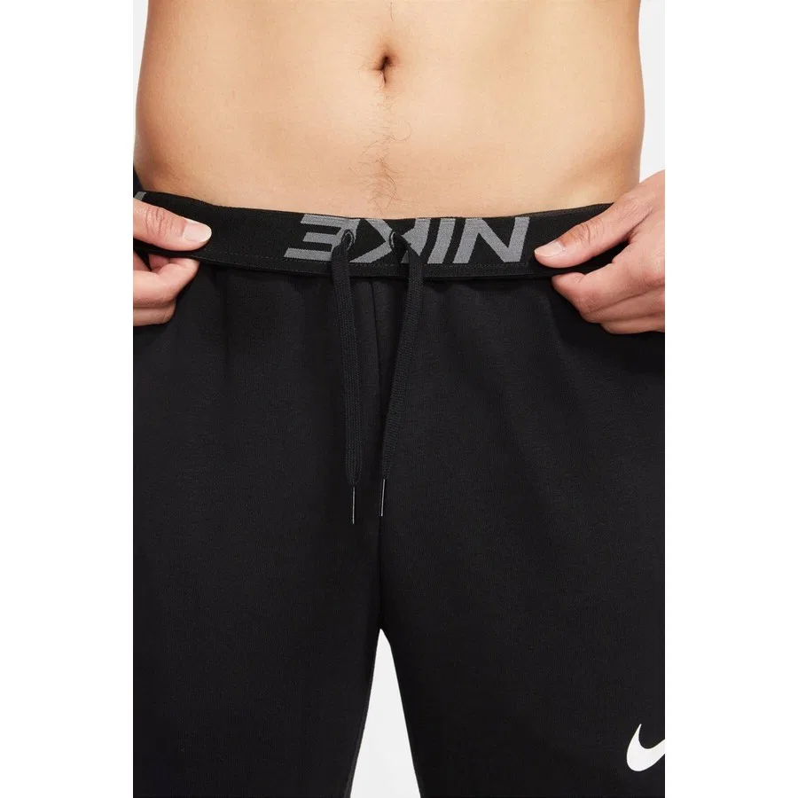 Спортивные штаны с зауженным кроем Nike Dri Fit Tapered Training, Черный — фото 4