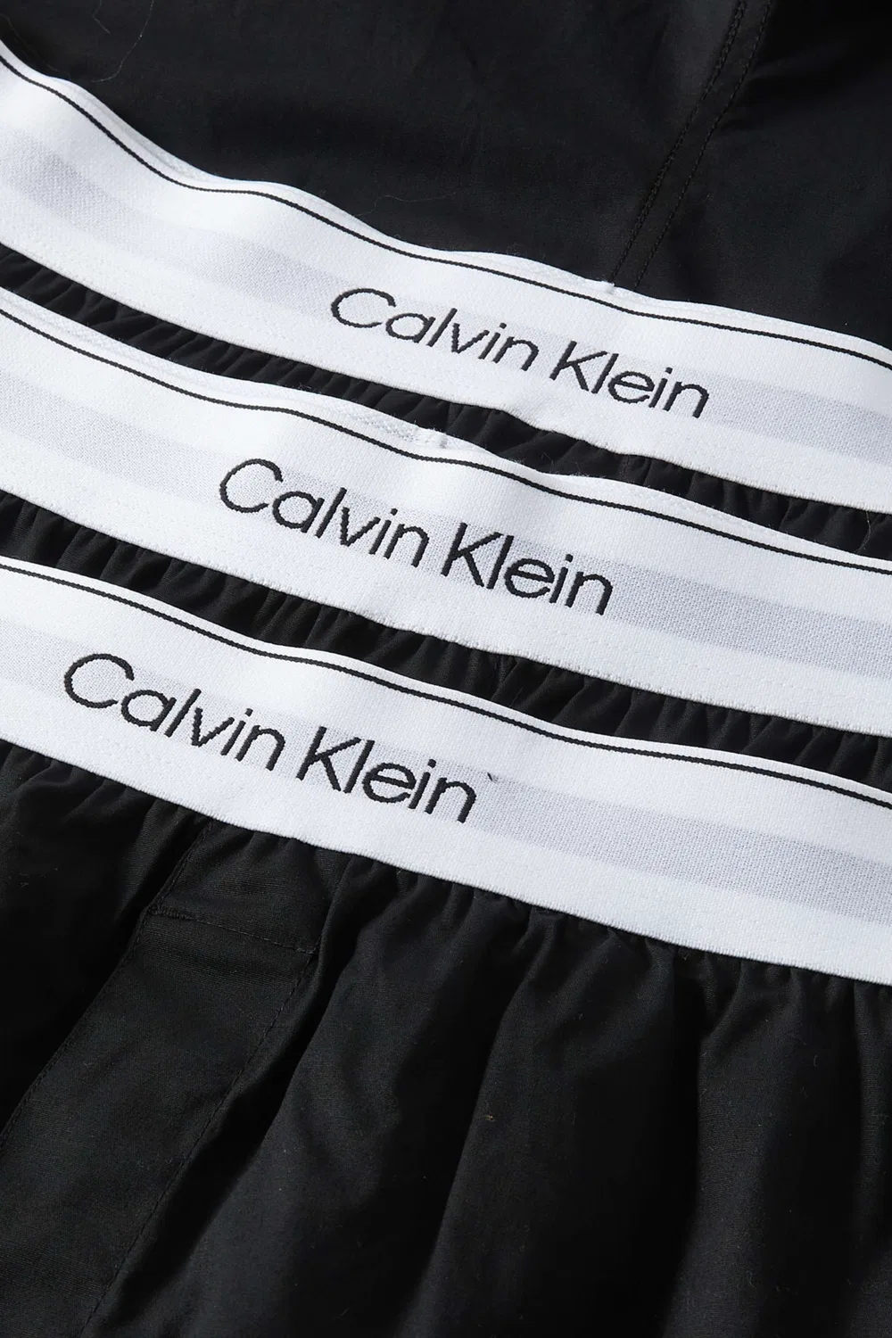 Трусы-боксеры слим-фит из хлопка комплект из 3 штук Icon Calvin Klein, черный — фото 2