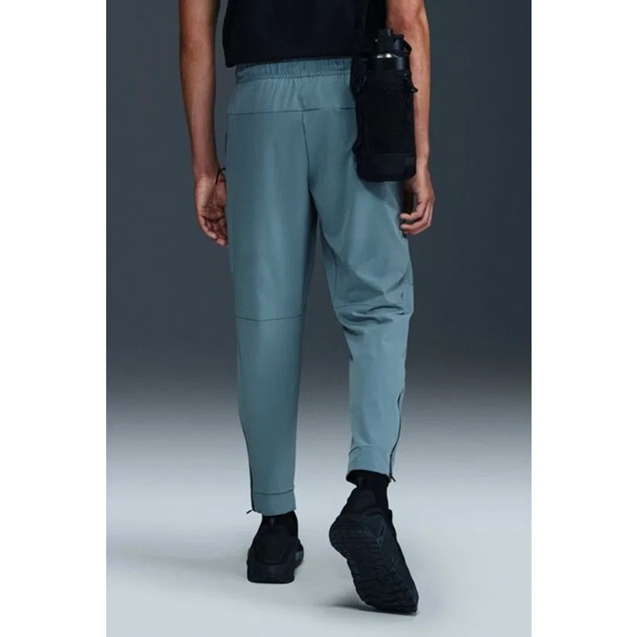 Спортивные штаны Nike Dri-FIT Unlimited с зауженным кроем и манжетами на молнии, M, Синий — фото 2