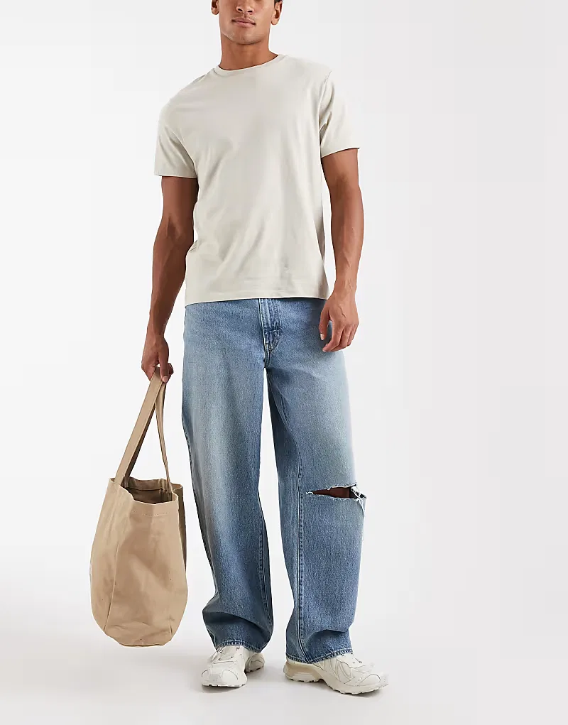 Свободные джинсы Levi's 578 с рваными коленями, средне-синий