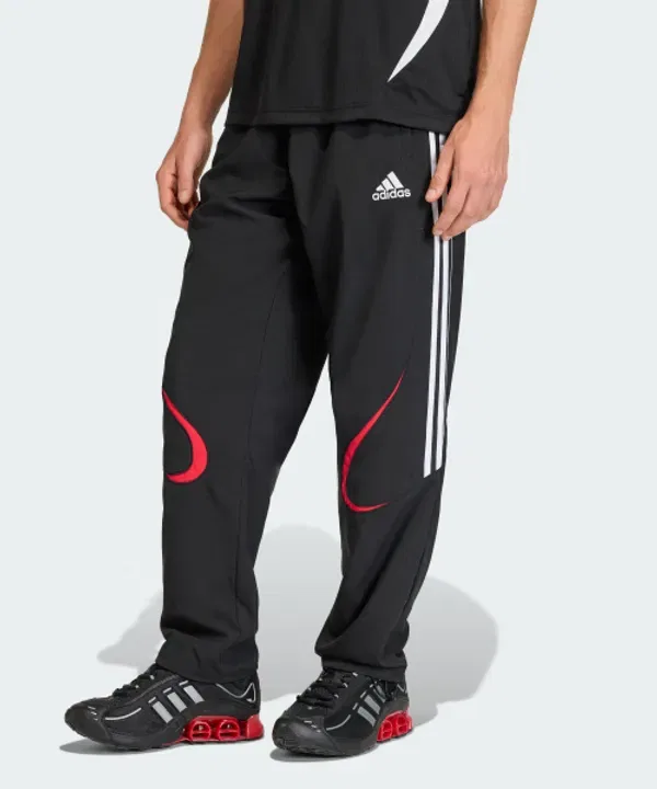 Тренировочные штаны свободного кроя Teamgeist Adicolor Adidas