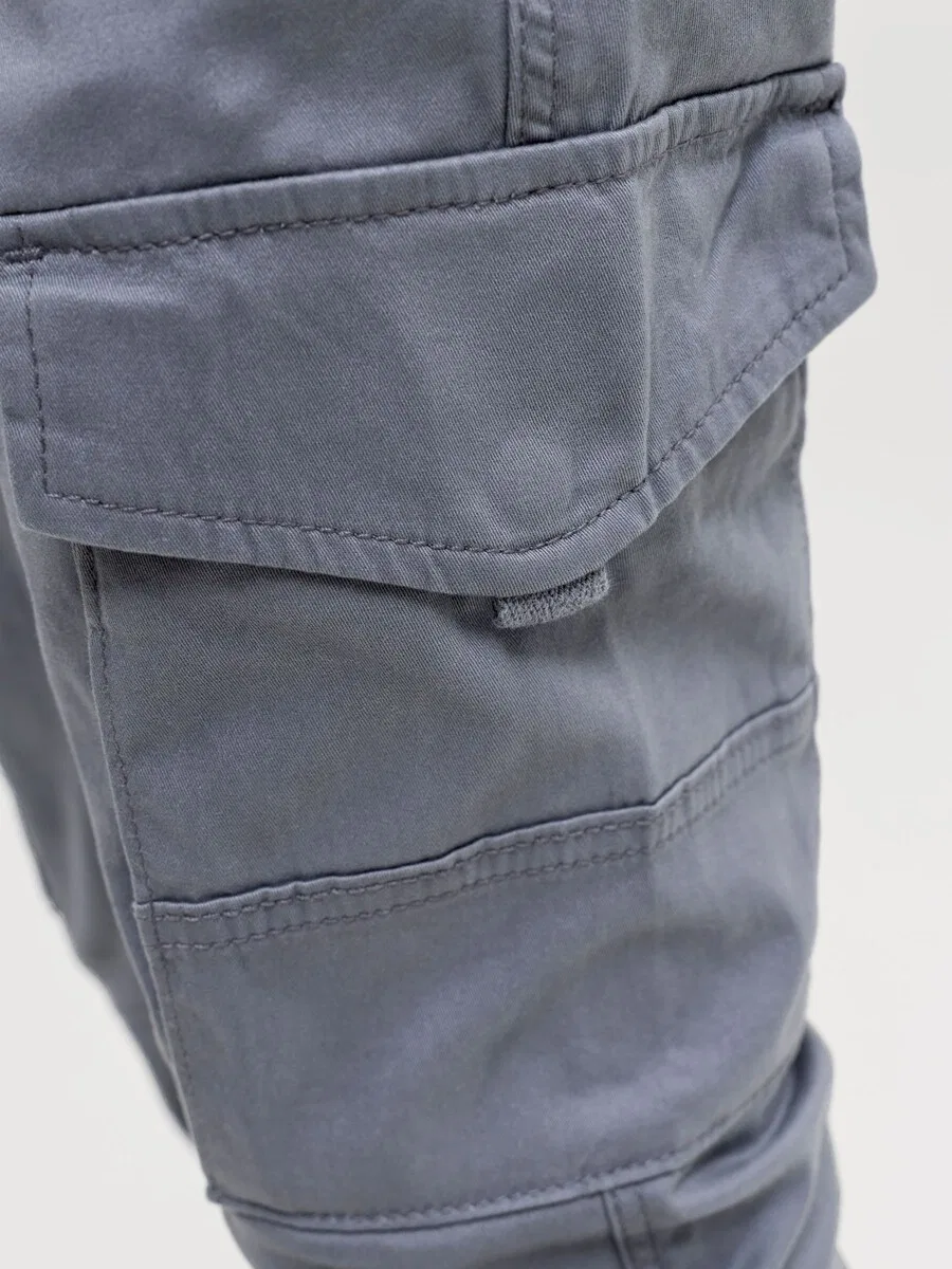 Детские зауженные брюки Jack & Jones Junior 'JPSTPAUL FLAKE' серого цвета — фото 4