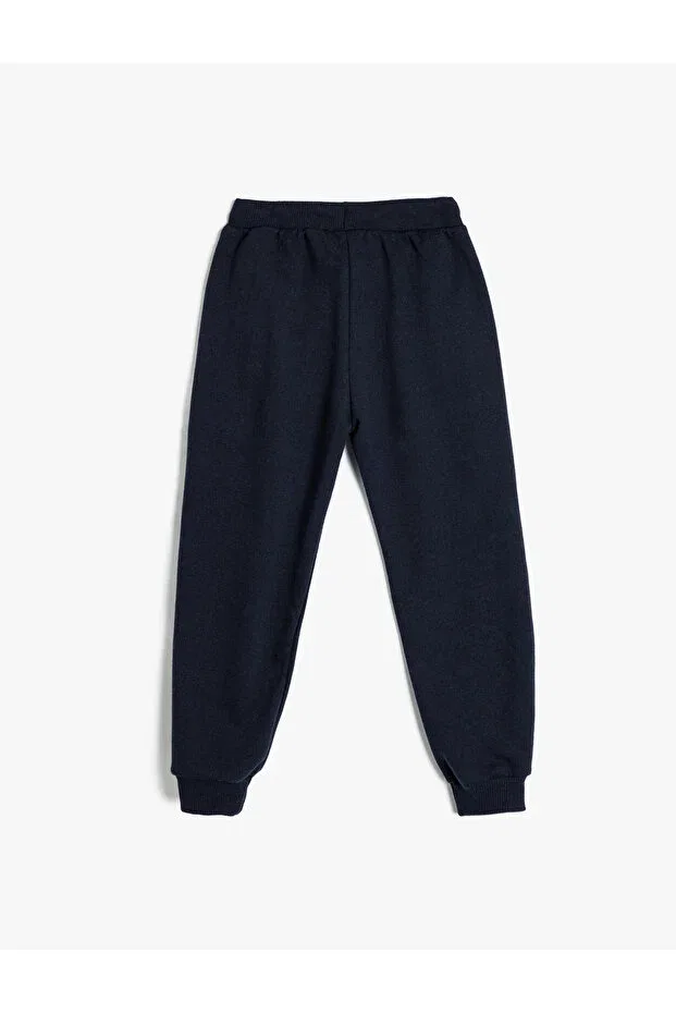 Детские спортивные штаны для мальчиков с принтом Jogger sweatpants with tie waist and sporty print detail Koton, Navy Blue — фото 2