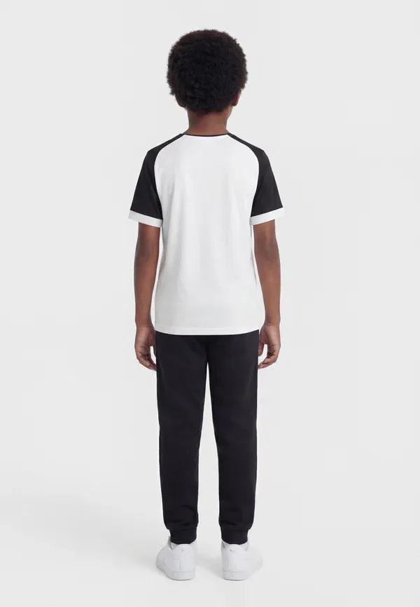 Футболка полупрозрачная Teamliga matchday unisex Puma, White/Black, белый/черный — фото 2