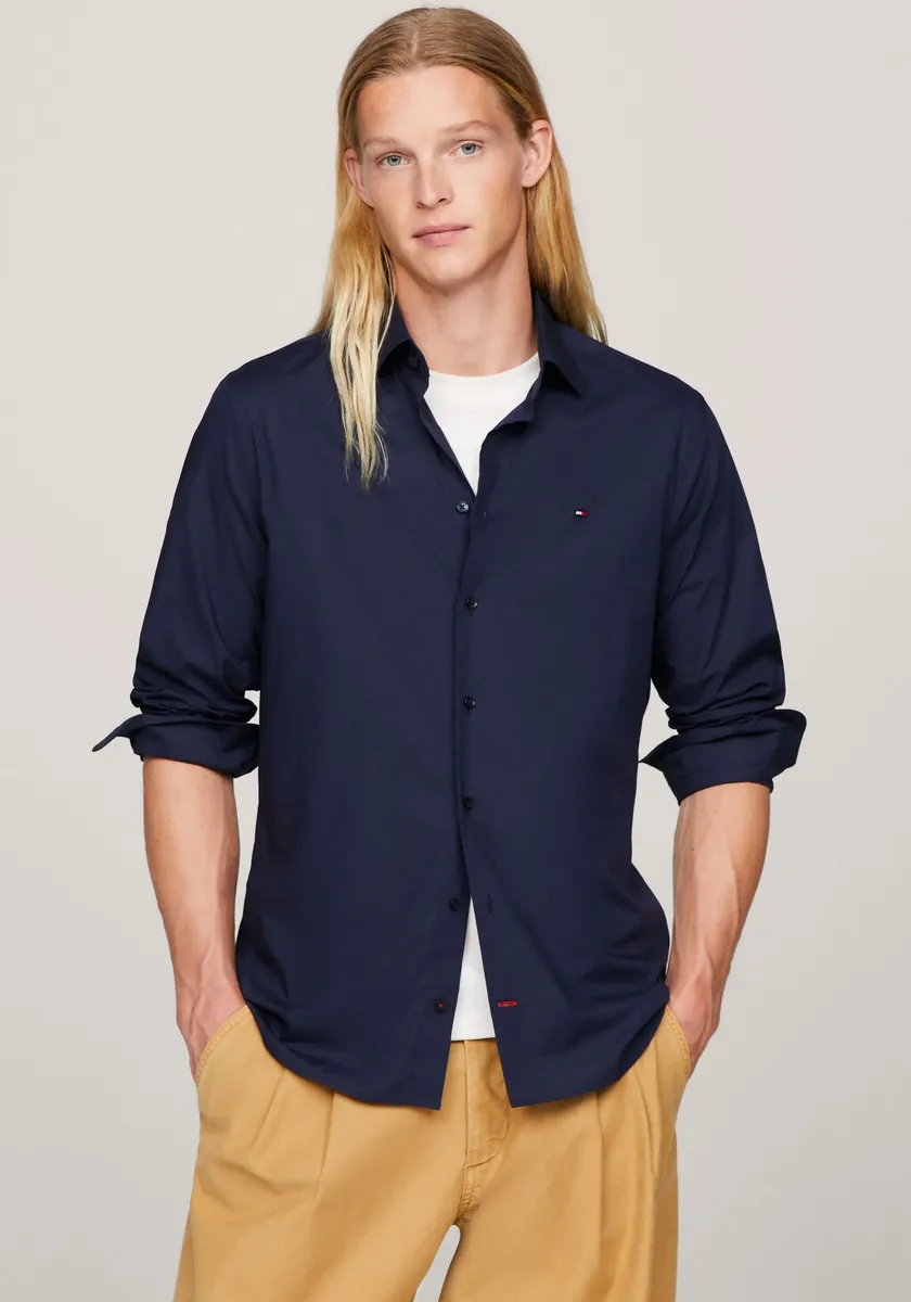 

Рубашка Tommy Hilfiger с длинными рукавами "CL FLEX POPLIN RF SHIRT" и тонким флажком на груди, цвет морской волны