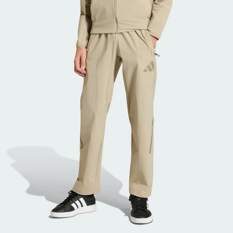 Штаны спортивные свободного кроя с принтом Z.N.E. Travel Woven adidas, Бежевый